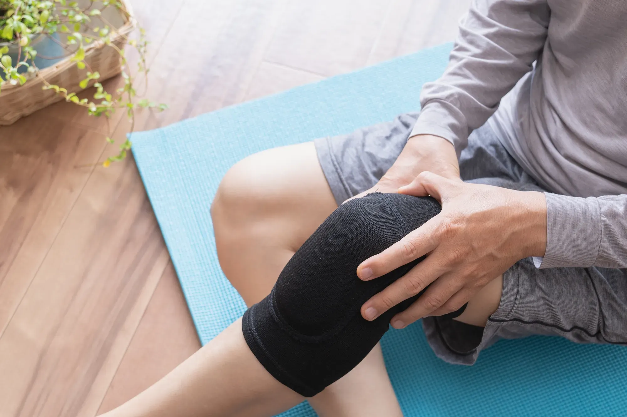 A man wearing knee support in an attempt to prevent joint damage